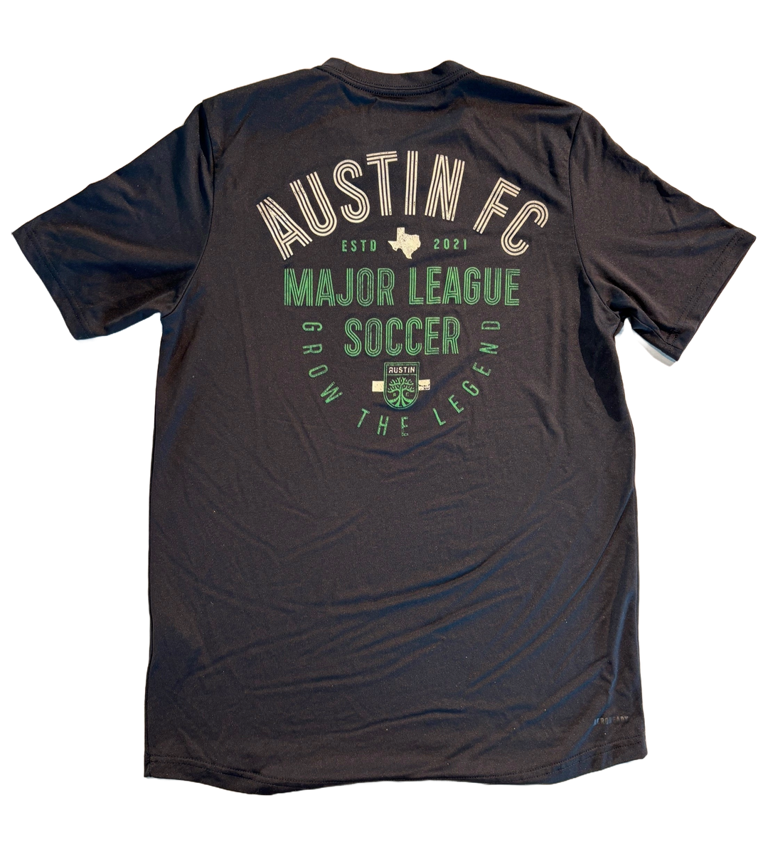 AUSTIN FC PREGAME TEE 24 PRIMARY CREST BLACK